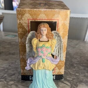 Elegant Angel Figurine with Floral Bouquet